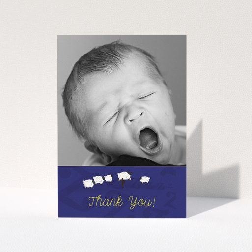A baby thank you card named "Sleepy Time". It is an A5 card in a portrait orientation. It is a photographic baby thank you card with room for 1 photo. "Sleepy Time" is available as a folded card, with tones of navy blue and white.
