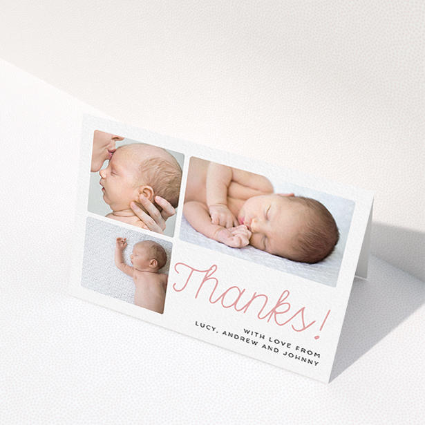 A baby thank you card template titled "Thank You Cursive". It is an A6 card in a landscape orientation. It is a photographic baby thank you card with room for 3 photos. "Thank You Cursive" is available as a folded card, with tones of white and pink.