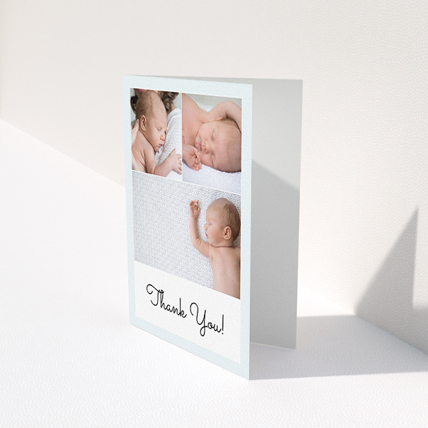 A baby thank you card template titled "Thank You!". It is an A6 card in a portrait orientation. It is a photographic baby thank you card with room for 3 photos. "Thank You!" is available as a folded card, with tones of blue and white.