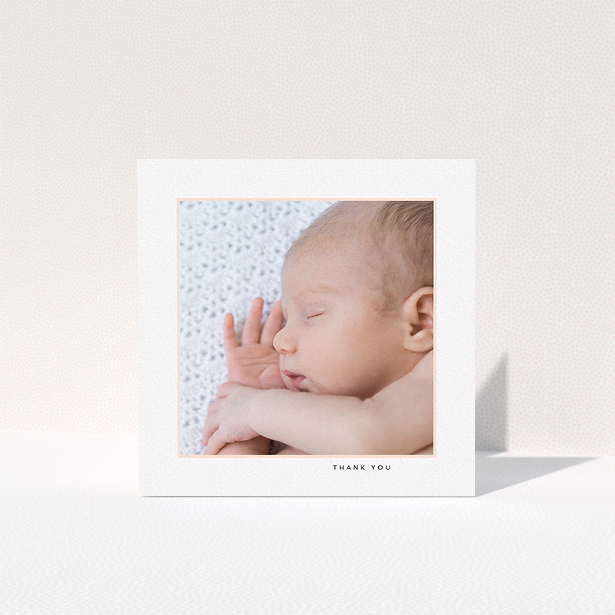 A baby thank you card template titled "Thin Pink Frame". It is a square (148mm x 148mm) card in a square orientation. It is a photographic baby thank you card with room for 1 photo. "Thin Pink Frame" is available as a folded card, with tones of white and pink.
