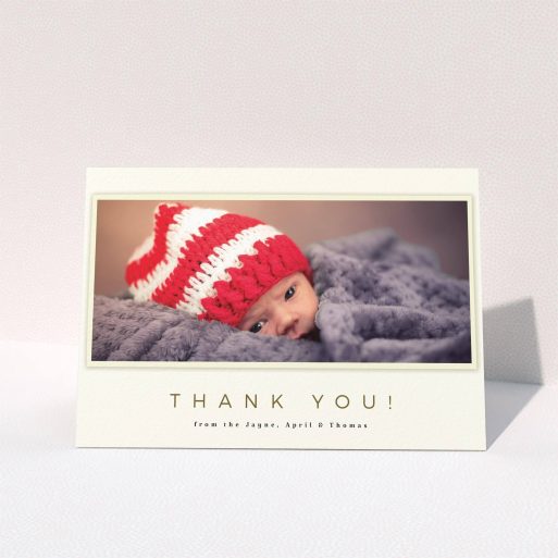 A baby thank you card design called "Torn Cream Frame". It is an A6 card in a landscape orientation. It is a photographic baby thank you card with room for 1 photo. "Torn Cream Frame" is available as a folded card, with mainly cream colouring.