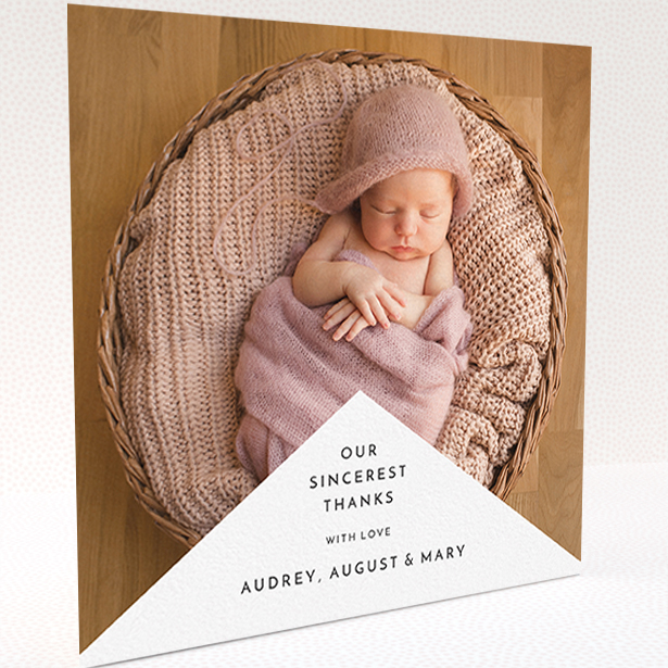 A baby thank you card called "Wedge Frame". It is a square (148mm x 148mm) card in a square orientation. It is a photographic baby thank you card with room for 1 photo. "Wedge Frame" is available as a folded card, with mainly white colouring.