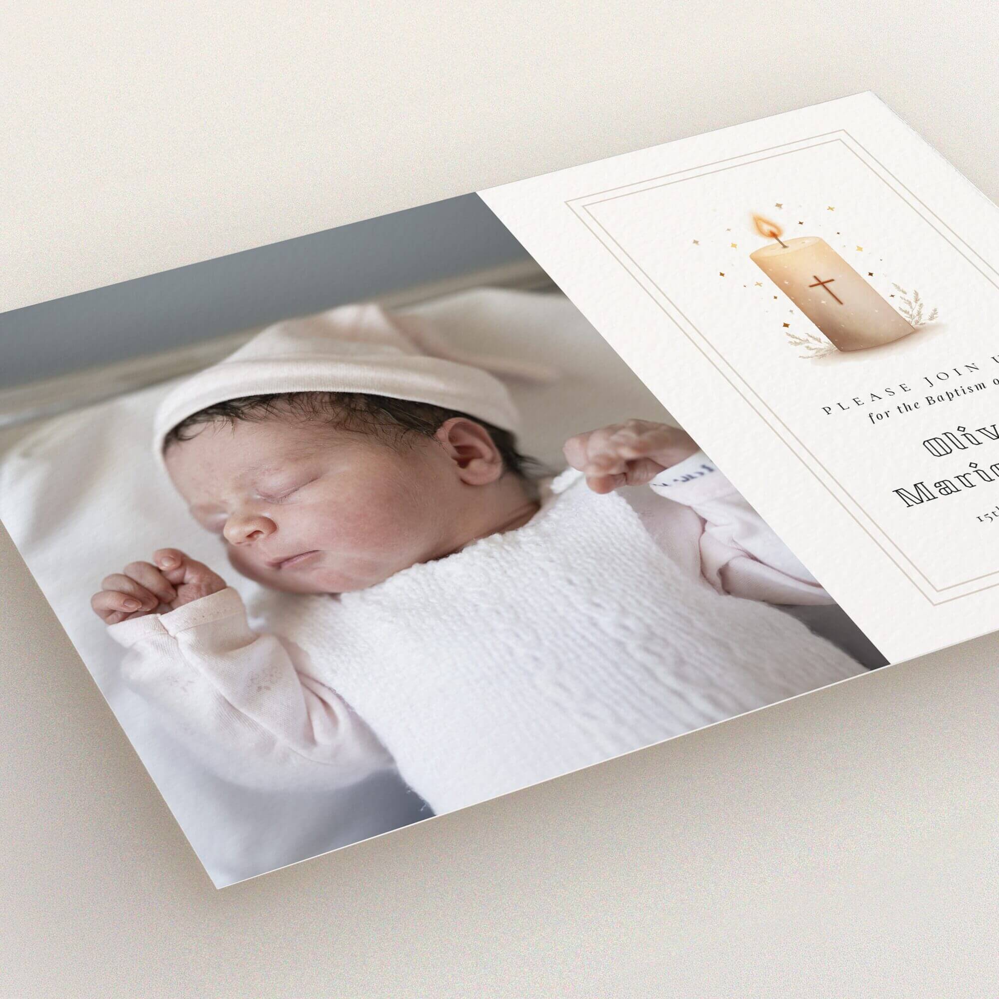 Christening invitation design featuring a single photo of a baby with a candle illustration on a white background.