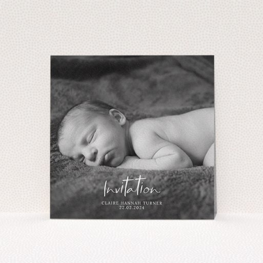 A baptism invitation design called "Central Script". It is a square (148mm x 148mm) invite card in a square orientation. It is a photographic baptism invitation with room for 1 photo. "Central Script" is available as a flat invite card, with mainly white colouring.