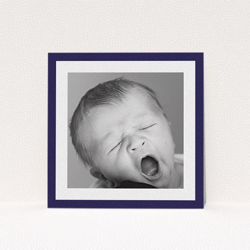 A baptism invitation design named "Classic Navy Photo Frame". It is a square (148mm x 148mm) invite card in a square orientation. It is a photographic baptism invitation with room for 1 photo. "Classic Navy Photo Frame" is available as a flat invite card, with tones of blue and white.
