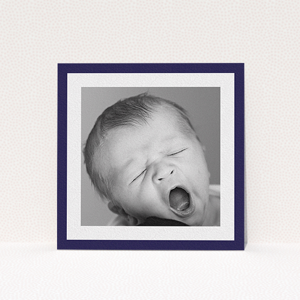 A baptism invitation design named "Classic Navy Photo Frame". It is a square (148mm x 148mm) invite card in a square orientation. It is a photographic baptism invitation with room for 1 photo. "Classic Navy Photo Frame" is available as a flat invite card, with tones of blue and white.