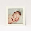 A baptism invitation design titled "Deco Cream Frame". It is a square (148mm x 148mm) invite card in a square orientation. It is a photographic baptism invitation with room for 1 photo. "Deco Cream Frame" is available as a flat invite card, with mainly cream colouring.