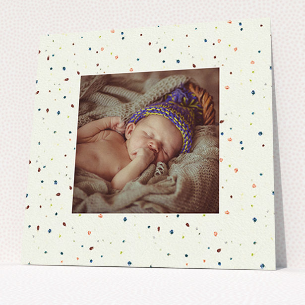 A baptism invitation named "Dot-dot-dot". It is a square (148mm x 148mm) invite card in a square orientation. It is a photographic baptism invitation with room for 1 photo. "Dot-dot-dot" is available as a flat invite card, with mainly cream colouring.