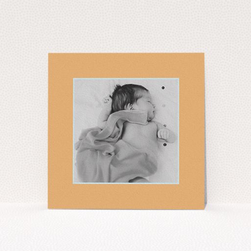 A baptism invitation named "Orange Mint Photo Frame". It is a square (148mm x 148mm) invite card in a square orientation. It is a photographic baptism invitation with room for 1 photo. "Orange Mint Photo Frame" is available as a flat invite card, with tones of orange and blue.