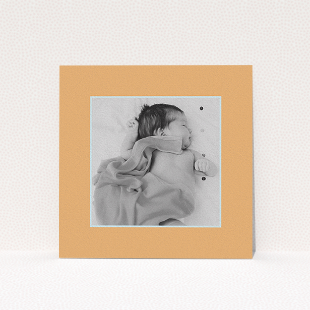 A baptism invitation named "Orange Mint Photo Frame". It is a square (148mm x 148mm) invite card in a square orientation. It is a photographic baptism invitation with room for 1 photo. "Orange Mint Photo Frame" is available as a flat invite card, with tones of orange and blue.