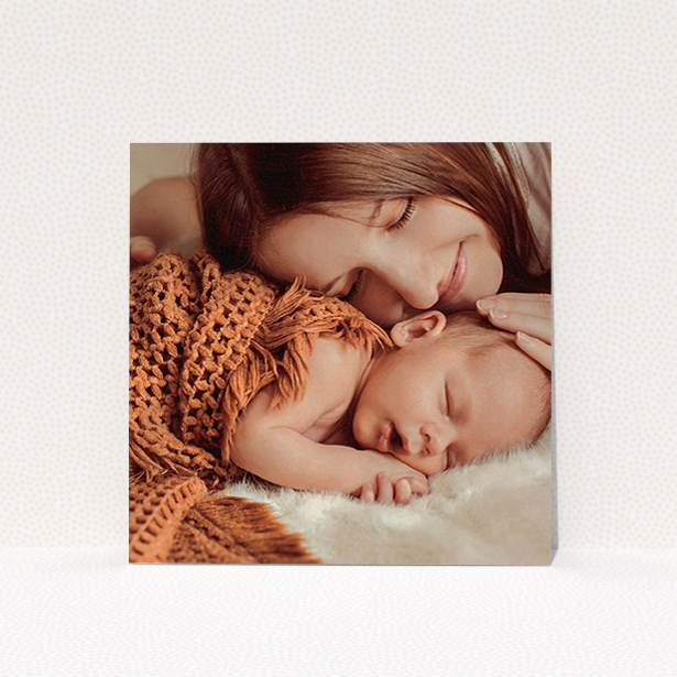 A baptism invitation design called "Our New Arrival". It is a square (148mm x 148mm) invite card in a square orientation. It is a photographic baptism invitation with room for 1 photo. "Our New Arrival" is available as a flat invite card, with mainly white colouring.