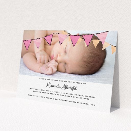 A baptism invitation template titled 'Pink Bunting'. It is an A6 invite card in a landscape orientation. It is a photographic baptism invitation with room for 1 photo. 'Pink Bunting' is available as a flat invite card, with tones of pink and white.