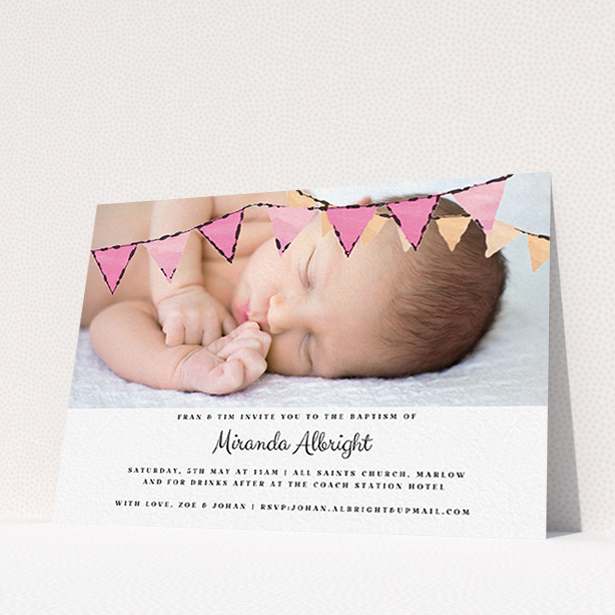 A baptism invitation template titled "Pink Bunting". It is an A6 invite card in a landscape orientation. It is a photographic baptism invitation with room for 1 photo. "Pink Bunting" is available as a flat invite card, with tones of pink and white.