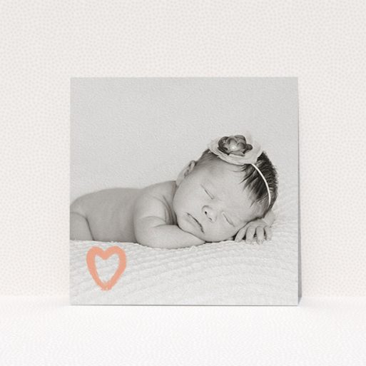 A baptism invitation design called "Pink heart motif". It is a square (148mm x 148mm) invite card in a square orientation. It is a photographic baptism invitation with room for 1 photo. "Pink heart motif" is available as a flat invite card, with mainly light pink colouring.