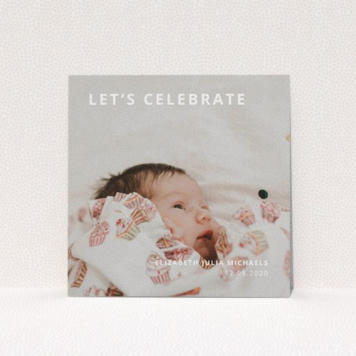 A baptism invitation design called "Sans Serif". It is a square (148mm x 148mm) invite card in a square orientation. It is a photographic baptism invitation with room for 1 photo. "Sans Serif" is available as a flat invite card, with mainly white colouring.