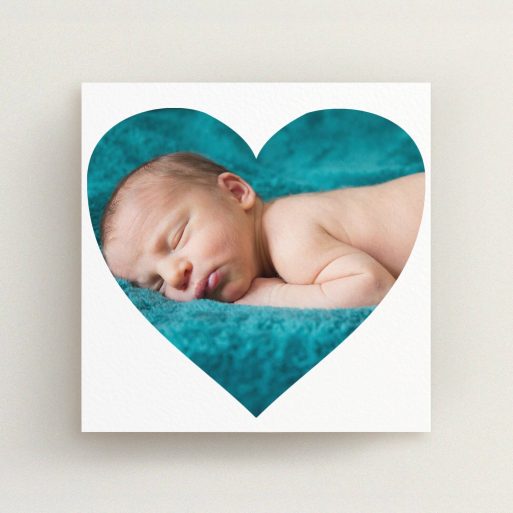 Baptism Invitation Design - "Simple Heart Frame" A baptism invitation named "Simple Heart Frame". It is a square (148mm x 148mm) invite card in a square orientation. It is a photographic baptism invitation with room for 1 photo. "Simple Heart Frame" is available as a flat invite card, with mainly white colouring.
