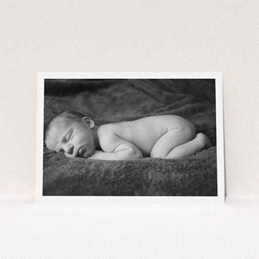 A baptism invitation called "Thick White Framed Photo". It is an A6 invite card in a landscape orientation. It is a photographic baptism invitation with room for 1 photo. "Thick White Framed Photo" is available as a flat invite card, with mainly white colouring.