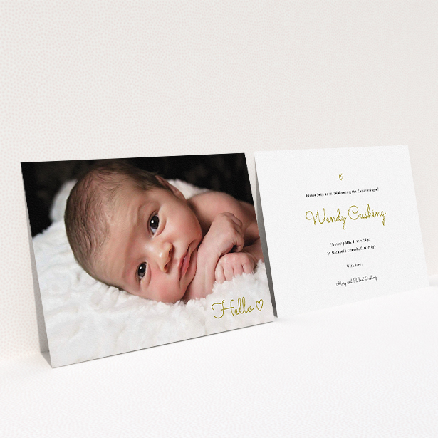 A baptism invitation design called "We say hello". It is an A5 invite card in a landscape orientation. It is a photographic baptism invitation with room for 1 photo. "We say hello" is available as a flat invite card, with mainly gold colouring.