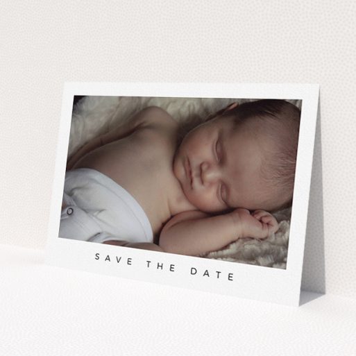 A baptism invitation template titled 'Welcome to the World'. It is an A5 invite card in a landscape orientation. It is a photographic baptism invitation with room for 1 photo. 'Welcome to the World' is available as a flat invite card, with mainly white colouring.