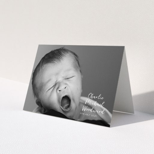A baptism thank you card design called '1 Photo Full'. It is an A5 card in a landscape orientation. It is a photographic baptism thank you card with room for 1 photo. '1 Photo Full' is available as a folded card, with mainly white colouring.