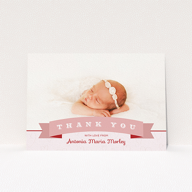 A baptism thank you card called "Big Banner". It is an A6 card in a landscape orientation. It is a photographic baptism thank you card with room for 1 photo. "Big Banner" is available as a flat card, with tones of pink and white.