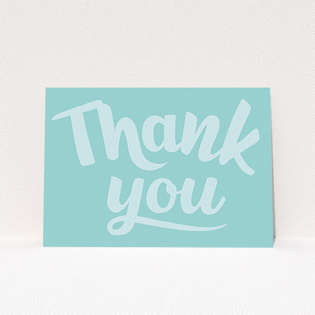 A baptism thank you card named "Big Blue Typography". It is an A6 card in a landscape orientation. "Big Blue Typography" is available as a flat card, with mainly blue colouring.