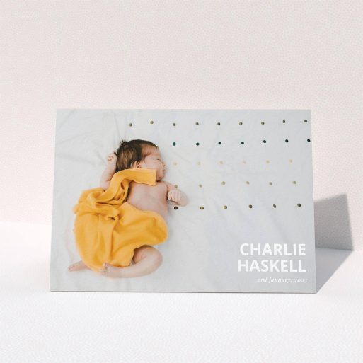 A baptism thank you card named "Bold Photo Corner". It is an A5 card in a landscape orientation. It is a photographic baptism thank you card with room for 1 photo. "Bold Photo Corner" is available as a folded card, with mainly white colouring.