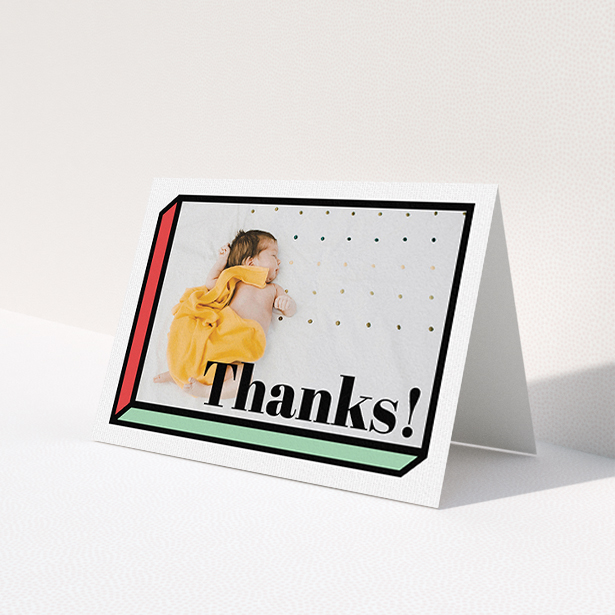A baptism thank you card design named 'Chip Off The Old Block'. It is an A6 card in a landscape orientation. It is a photographic baptism thank you card with room for 1 photo. 'Chip Off The Old Block' is available as a folded card, with tones of green and red.