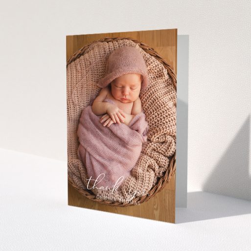 A baptism thank you card template titled 'Classic Thank You'. It is an A5 card in a portrait orientation. It is a photographic baptism thank you card with room for 1 photo. 'Classic Thank You' is available as a folded card, with mainly white colouring.