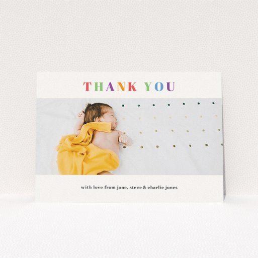 A baptism thank you card design named "Colourful Thanks". It is an A5 card in a landscape orientation. It is a photographic baptism thank you card with room for 1 photo. "Colourful Thanks" is available as a flat card, with tones of white and orange.