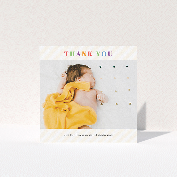 A baptism thank you card design titled "Colourful Thanks". It is a square (148mm x 148mm) card in a square orientation. It is a photographic baptism thank you card with room for 1 photo. "Colourful Thanks" is available as a folded card, with tones of white and orange.