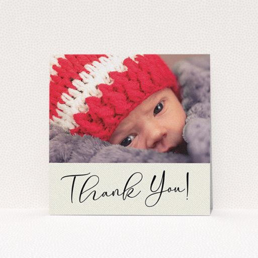 A baptism thank you card named "Cursive Thanks". It is a square (148mm x 148mm) card in a square orientation. It is a photographic baptism thank you card with room for 1 photo. "Cursive Thanks" is available as a flat card, with mainly cream colouring.