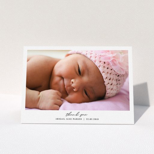 A baptism thank you card design named "Everything You Need". It is an A5 card in a landscape orientation. It is a photographic baptism thank you card with room for 1 photo. "Everything You Need" is available as a folded card, with mainly white colouring.