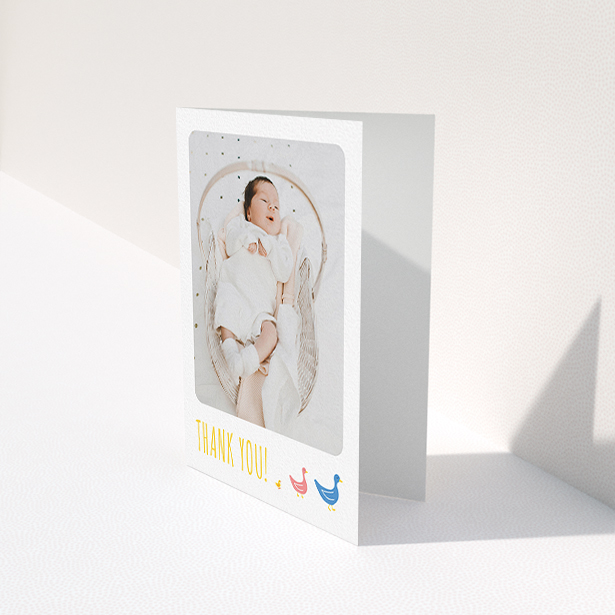 A baptism thank you card called "Family of Ducks". It is an A6 card in a portrait orientation. It is a photographic baptism thank you card with room for 1 photo. "Family of Ducks" is available as a folded card, with tones of yellow, blue and pink.