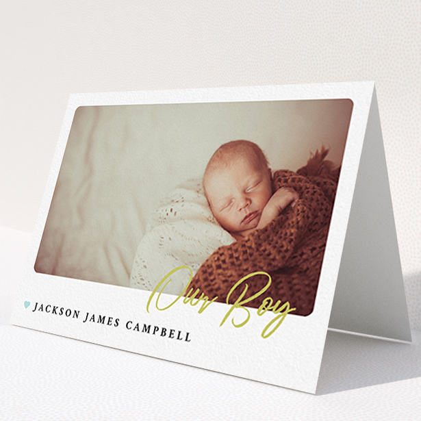A baptism thank you card named "Gold Stamp". It is an A6 card in a landscape orientation. It is a photographic baptism thank you card with room for 1 photo. "Gold Stamp" is available as a folded card, with tones of white and blue.