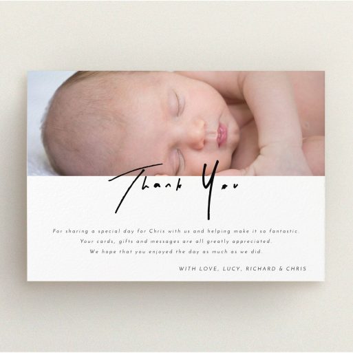 A baptism thank you card named "Half and Half". It is an A5 card in a landscape orientation. It is a photographic baptism thank you card with room for 1 photo. "Half and Half" is available as a flat card, with mainly white colouring.