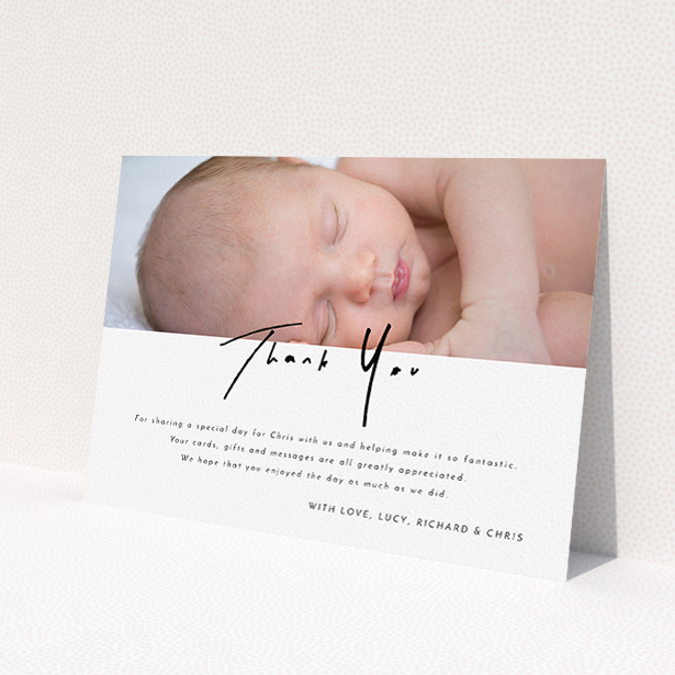 A baptism thank you card named "Half and Half". It is an A5 card in a landscape orientation. It is a photographic baptism thank you card with room for 1 photo. "Half and Half" is available as a flat card, with mainly white colouring.