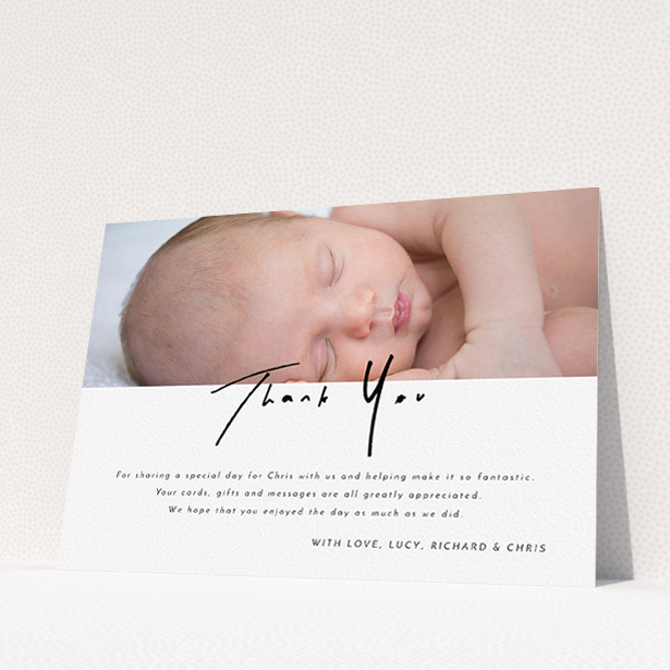 A baptism thank you card named "Half and Half". It is an A5 card in a landscape orientation. It is a photographic baptism thank you card with room for 1 photo. "Half and Half" is available as a flat card, with mainly white colouring.