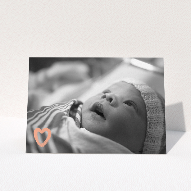 A baptism thank you card template titled "Hand Drawn Heart". It is an A5 card in a landscape orientation. It is a photographic baptism thank you card with room for 1 photo. "Hand Drawn Heart" is available as a folded card, with mainly white colouring.