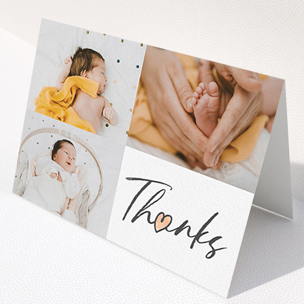 A baptism thank you card design titled "Handwritten Heart". It is an A6 card in a landscape orientation. It is a photographic baptism thank you card with room for 3 photos. "Handwritten Heart" is available as a folded card, with tones of black and white.