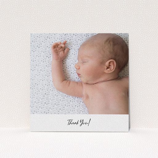 A baptism thank you card design called "Mr & Mrs Footer". It is a square (148mm x 148mm) card in a square orientation. It is a photographic baptism thank you card with room for 1 photo. "Mr & Mrs Footer" is available as a flat card, with mainly white colouring.