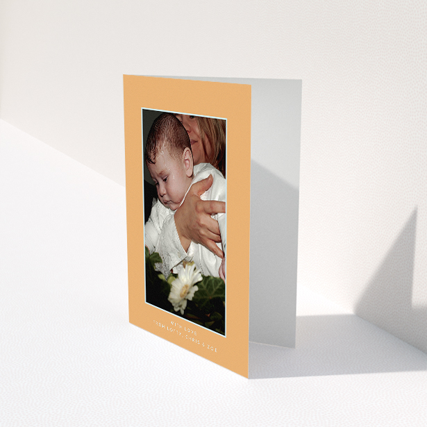 A baptism thank you card called "Orange and Mint". It is an A5 card in a portrait orientation. It is a photographic baptism thank you card with room for 1 photo. "Orange and Mint" is available as a folded card, with tones of orange and blue.
