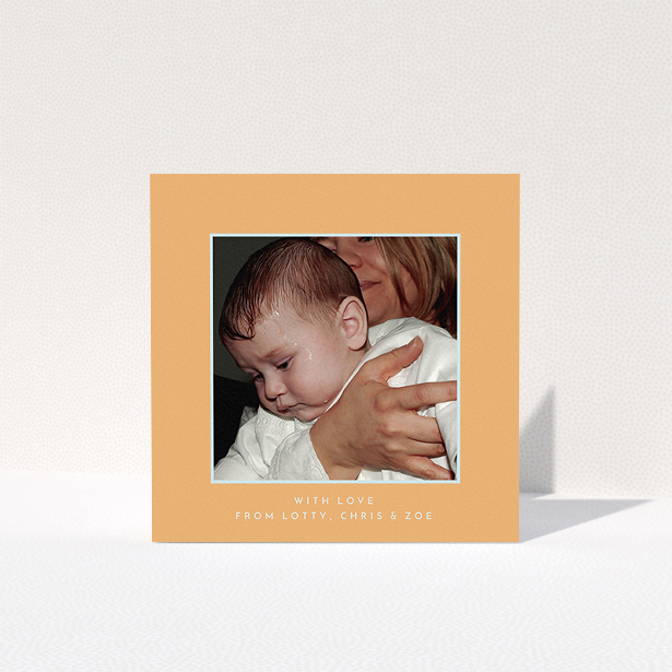 A baptism thank you card template titled "Orange and Mint". It is a square (148mm x 148mm) card in a square orientation. It is a photographic baptism thank you card with room for 1 photo. "Orange and Mint" is available as a folded card, with tones of orange and blue.