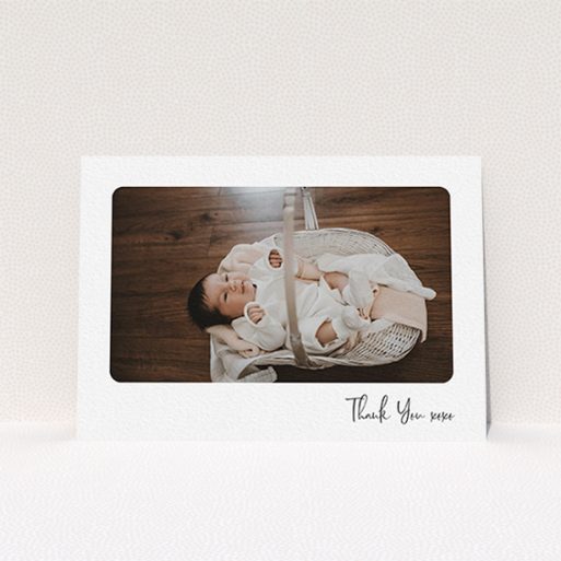 A baptism thank you card template titled "Rounded Thanks". It is an A6 card in a landscape orientation. It is a photographic baptism thank you card with room for 1 photo. "Rounded Thanks" is available as a flat card, with mainly white colouring.