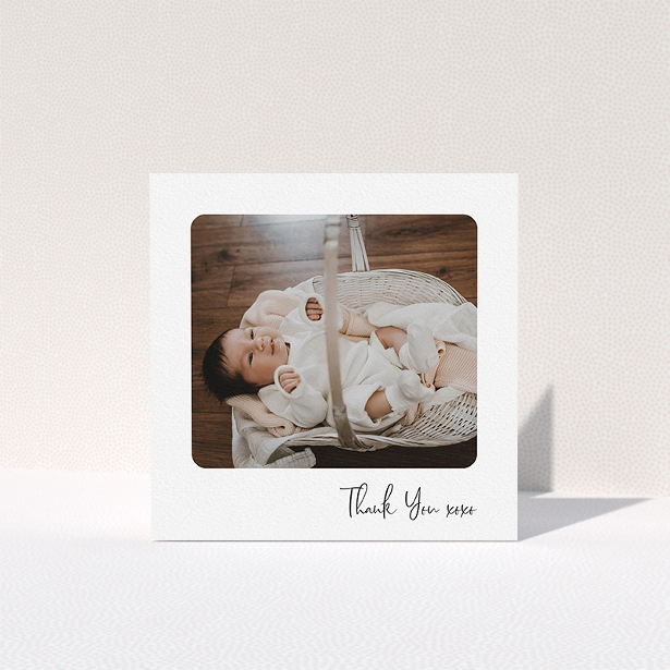 A baptism thank you card design called "Rounded Thanks". It is a square (148mm x 148mm) card in a square orientation. It is a photographic baptism thank you card with room for 1 photo. "Rounded Thanks" is available as a folded card, with mainly white colouring.