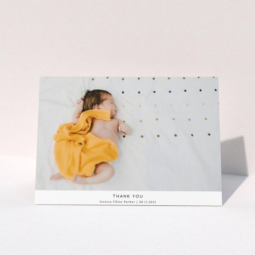 Baptism Thank You Card Design - "Sans Serif" A baptism thank you card design named "Sans Serif". It is an A5 card in a landscape orientation. It is a photographic baptism thank you card with room for 1 photo. "Sans Serif" is available as a folded card, with mainly white colouring.