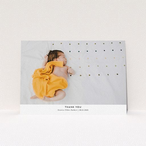A baptism thank you card design named "Sans Serif". It is an A6 card in a landscape orientation. It is a photographic baptism thank you card with room for 1 photo. "Sans Serif" is available as a flat card, with mainly white colouring.