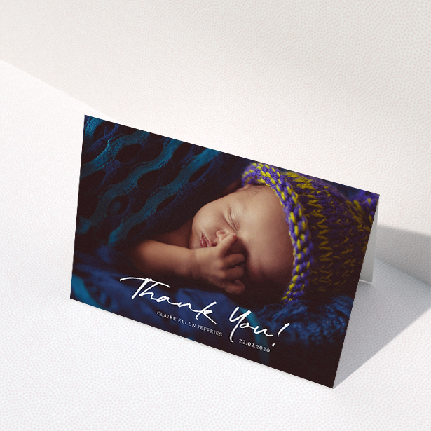 A baptism thank you card called "Simple Appreciation". It is an A5 card in a landscape orientation. It is a photographic baptism thank you card with room for 1 photo. "Simple Appreciation" is available as a folded card, with mainly white colouring.