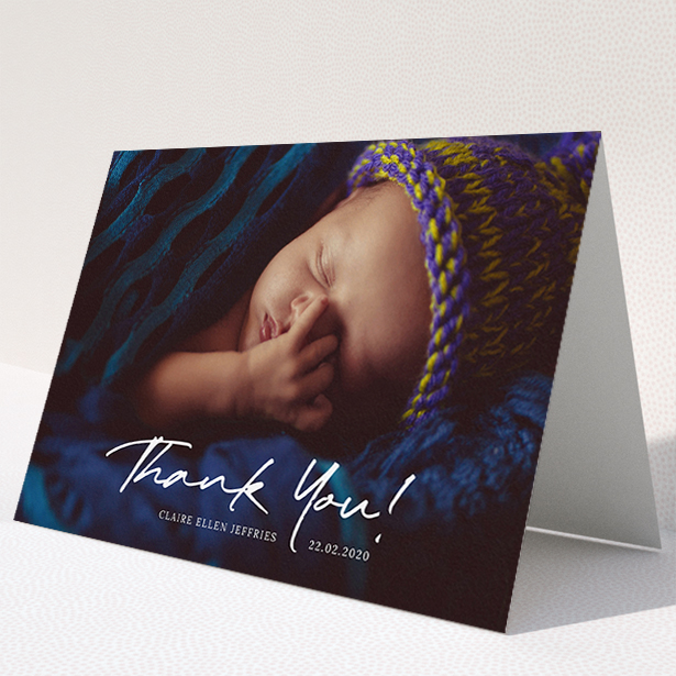 A baptism thank you card called "Simple Appreciation". It is an A5 card in a landscape orientation. It is a photographic baptism thank you card with room for 1 photo. "Simple Appreciation" is available as a folded card, with mainly white colouring.