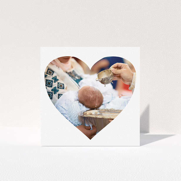 A baptism thank you card design named "Simple Heart Frames". It is a square (148mm x 148mm) card in a square orientation. It is a photographic baptism thank you card with room for 1 photo. "Simple Heart Frames" is available as a folded card, with mainly white colouring.